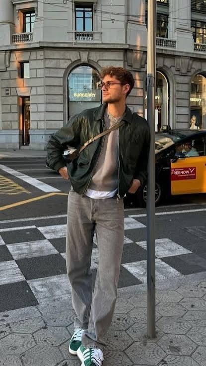 a guy with green jacket and grey jeans Ethnic Wear